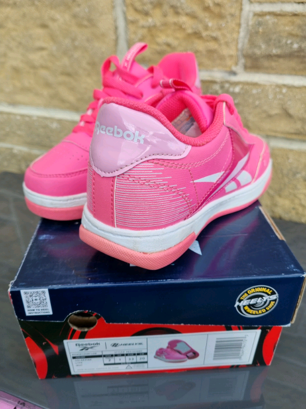 Girls Pink Reebok Heelys | in Yeovil 